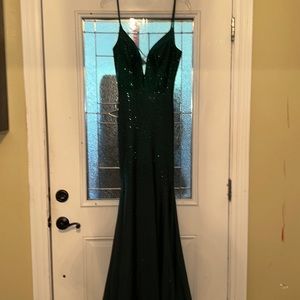 Green, Ellie Wilde Pageant/Prom dress. Size 4, with an open back.